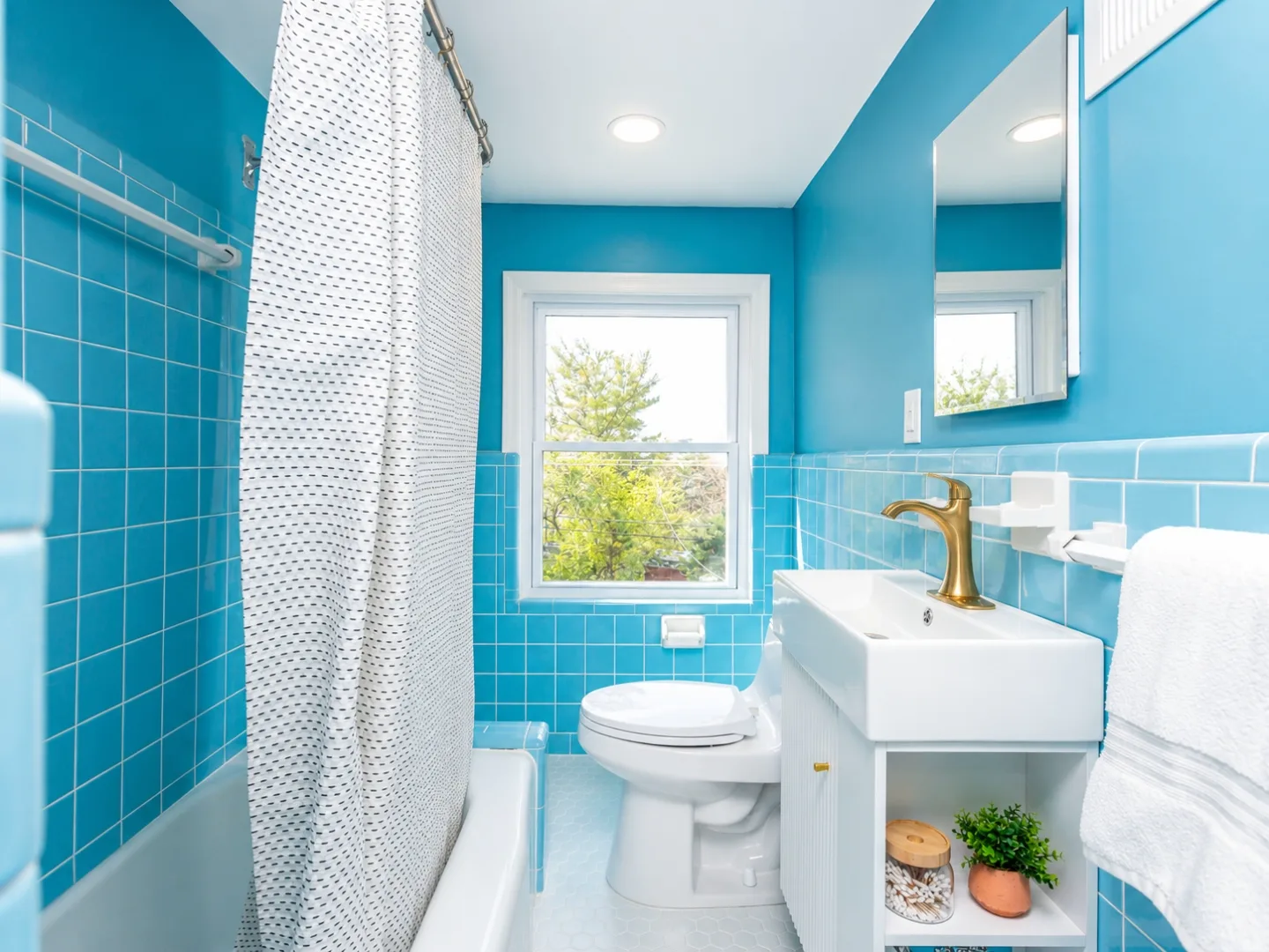 Kids bathroom with blue tile